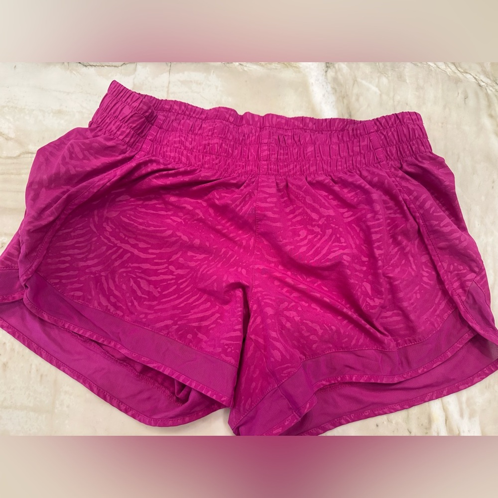 Athleta size small run short 4”